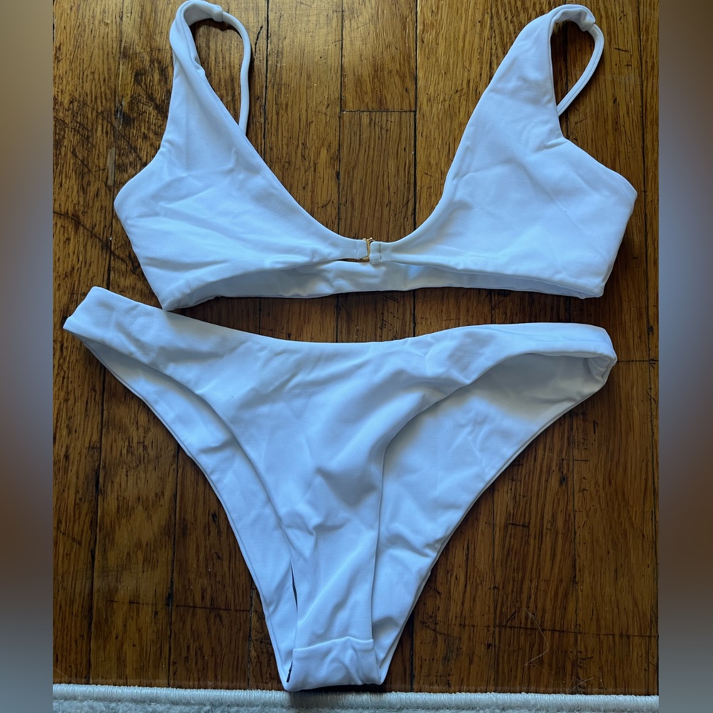 TJ Swim white bikini set, top size small, bottom size L. Brand new with tags